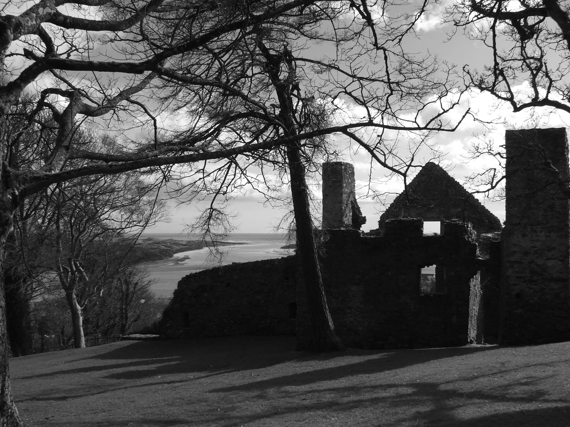 Dundrum Castle ruins overlooking the bay