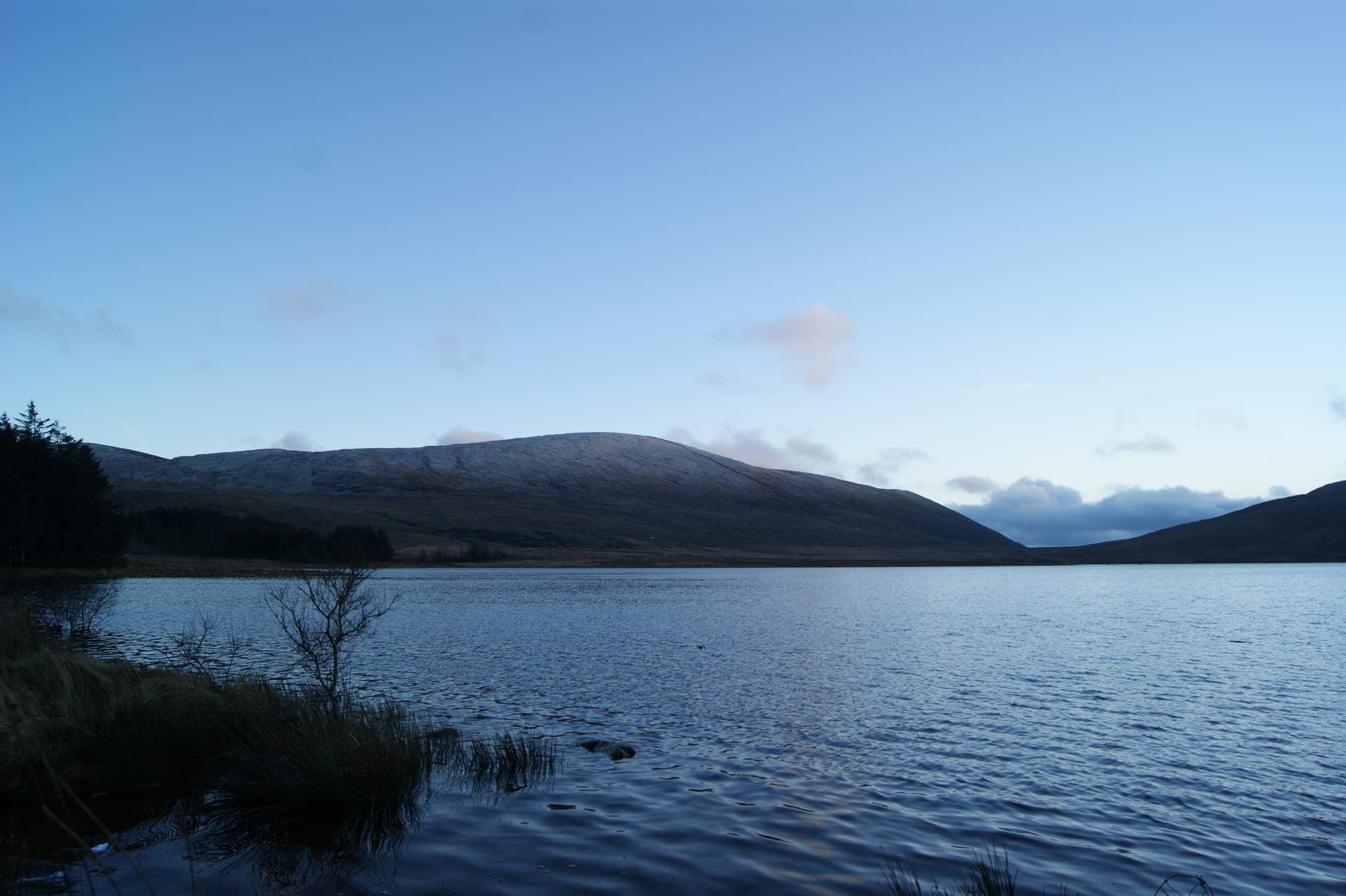 Milky Way arching over dark mountain silhouettes — Dark Skies Over the Mournes